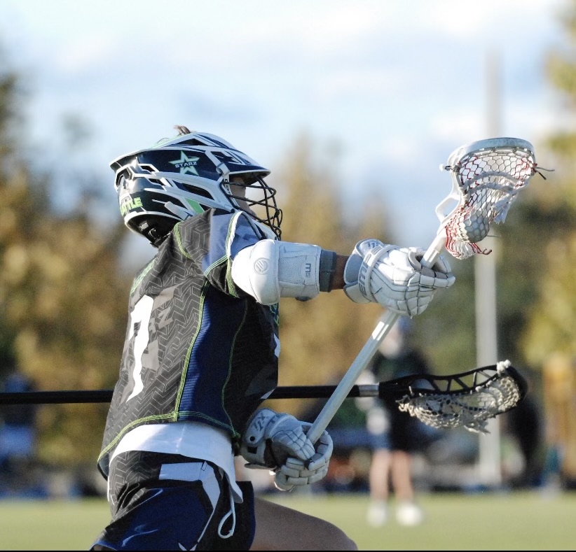 John Larson on the ball in his Seattle Starz uniform, number 1